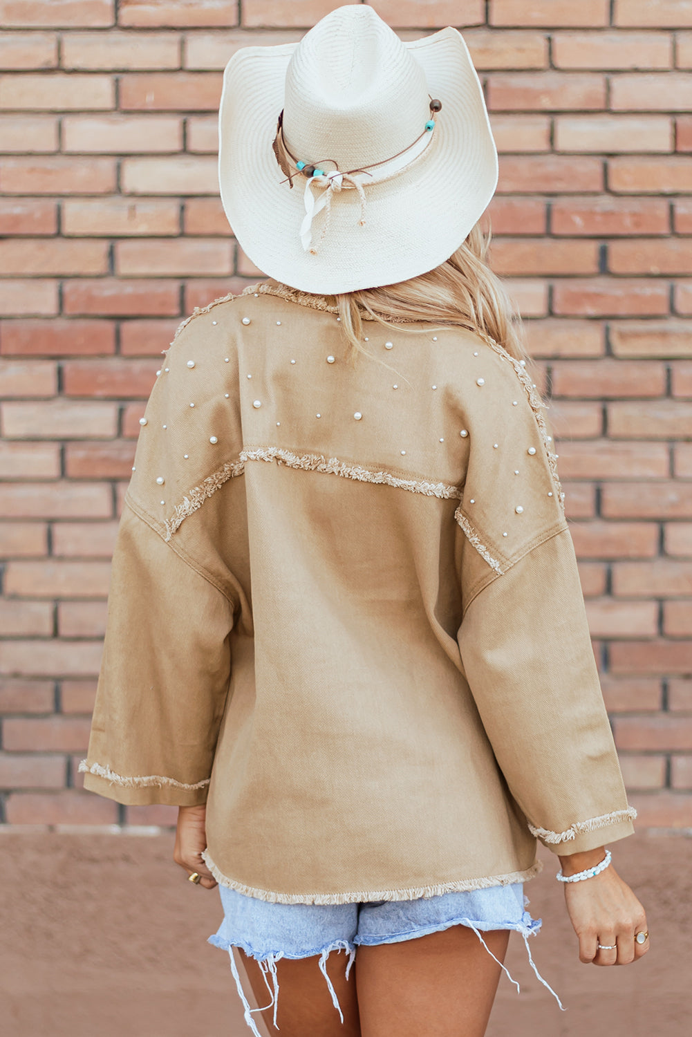 Jeansjacke mit Perlenbesatz