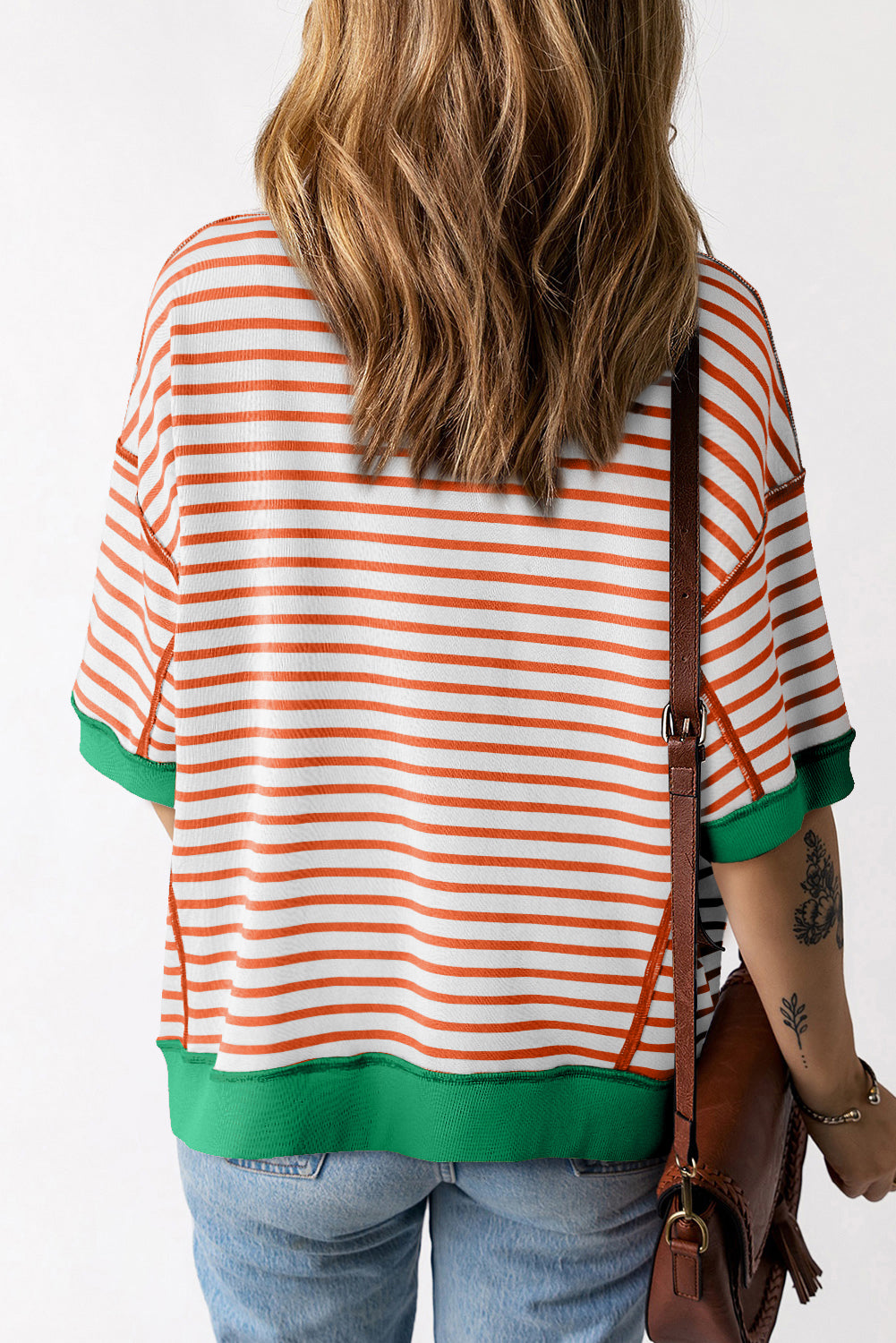 Gestreiftes Oversize-T-Shirt mit sichtbarem High Low