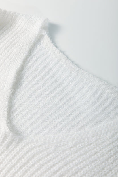 Weißer Pullover mit Perlen und Herzen
