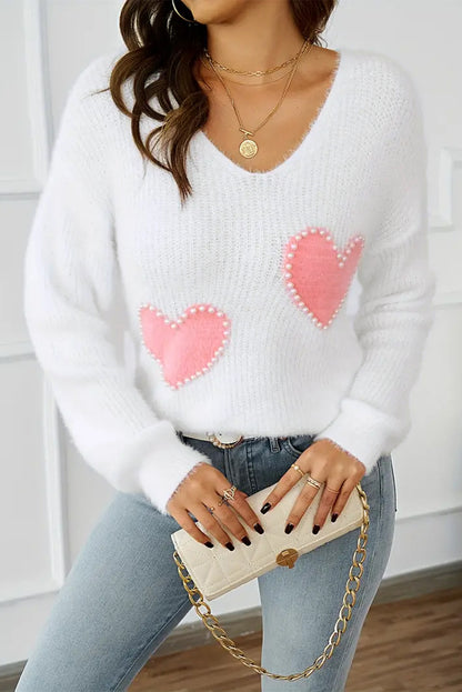 Weißer Pullover mit Perlen und Herzen