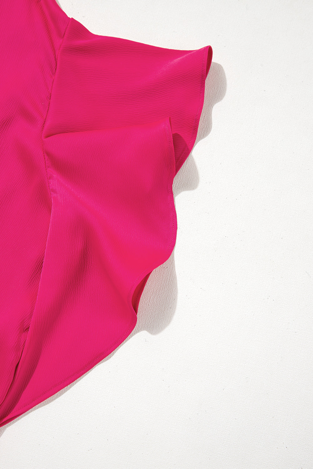 Elegante Bluse mit asymmetrischer Schulterpartie in Erdbeerrosa