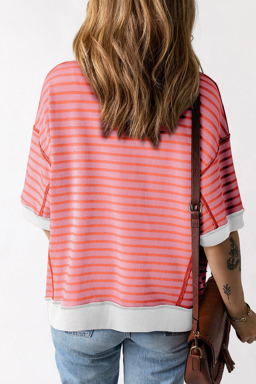 Gestreiftes Oversize-T-Shirt mit sichtbarem High Low
