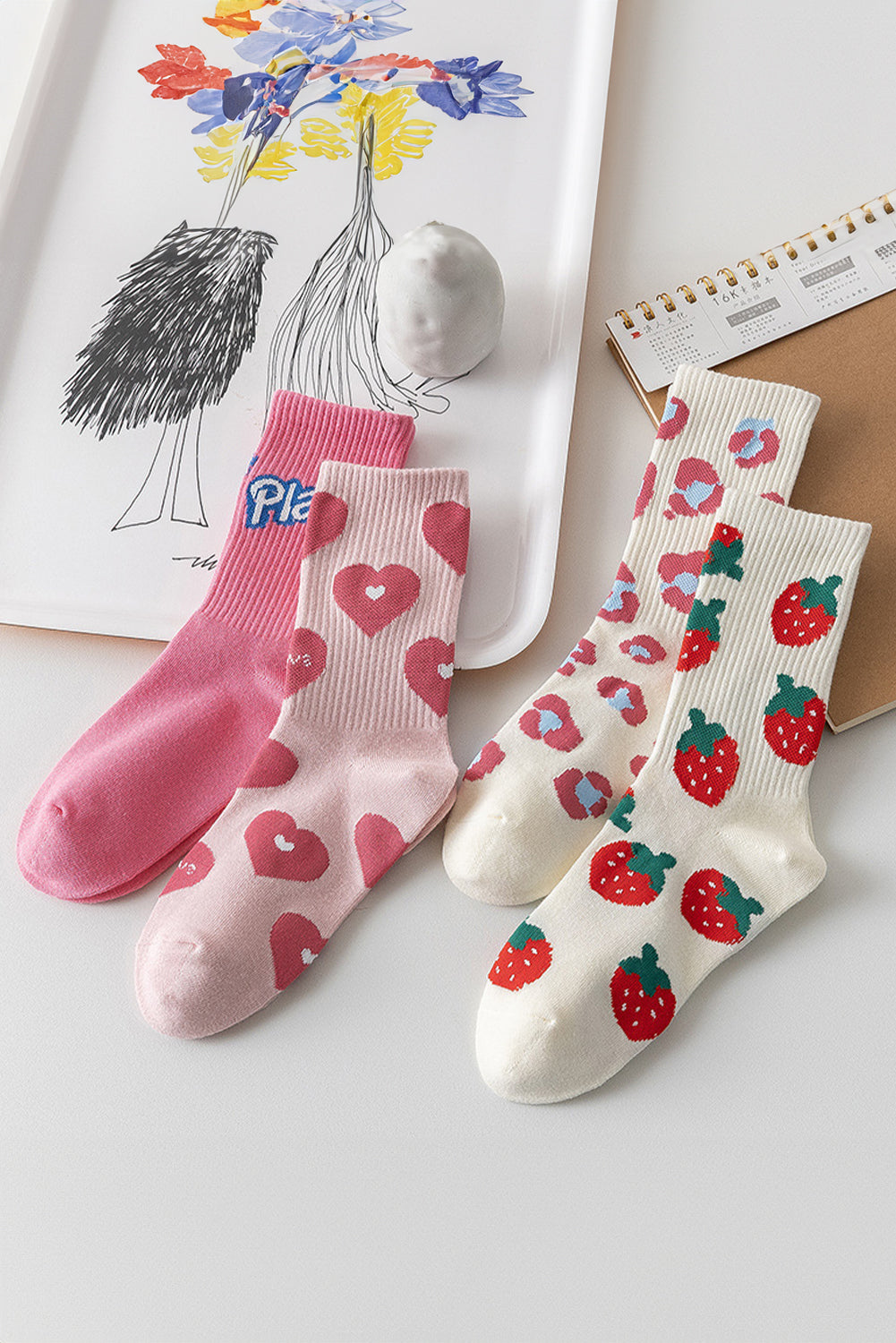 Hellrosa weiche Socken mit Herzmotiv