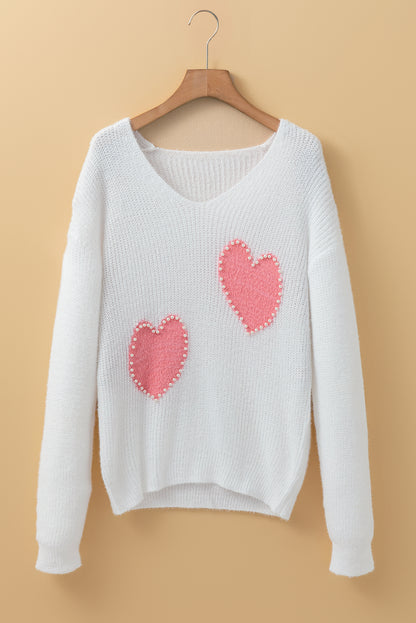 Weißer Pullover mit Perlen und Herzen